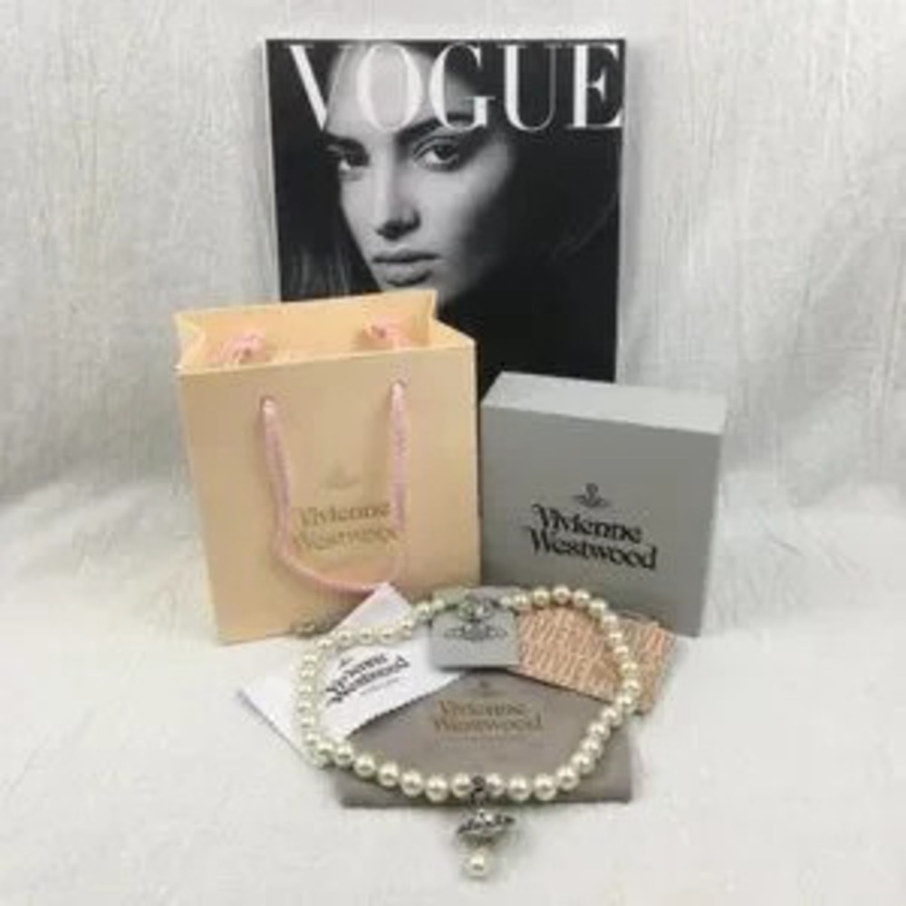 Vivienne Westwood Cream Pearl Necklace with Orb Pendant